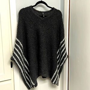 Shawl/sweater (does have an arm hole). Very soft and cozy!